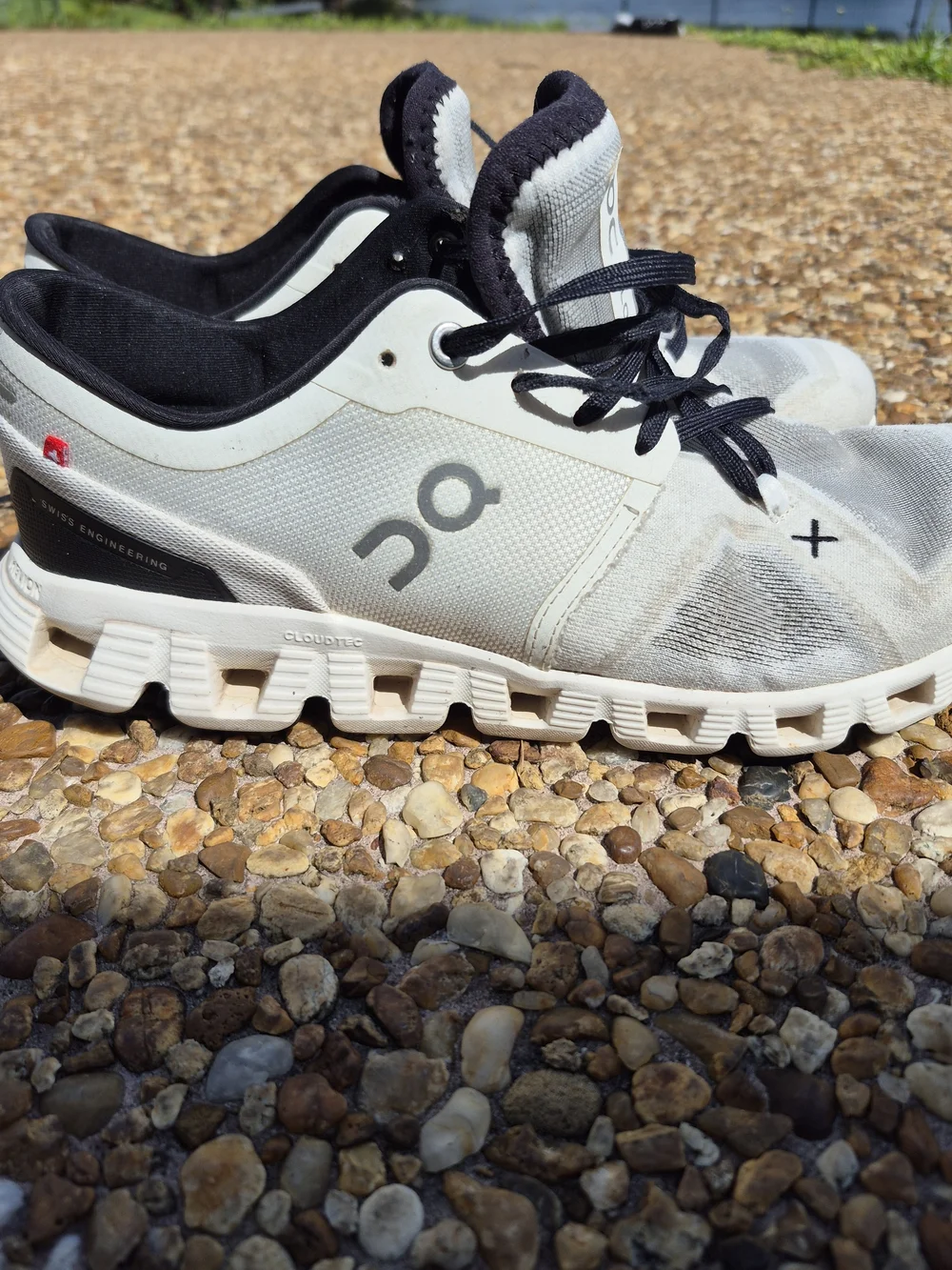 On Running Men’s Cloud Athletic Sneakers in White and Black